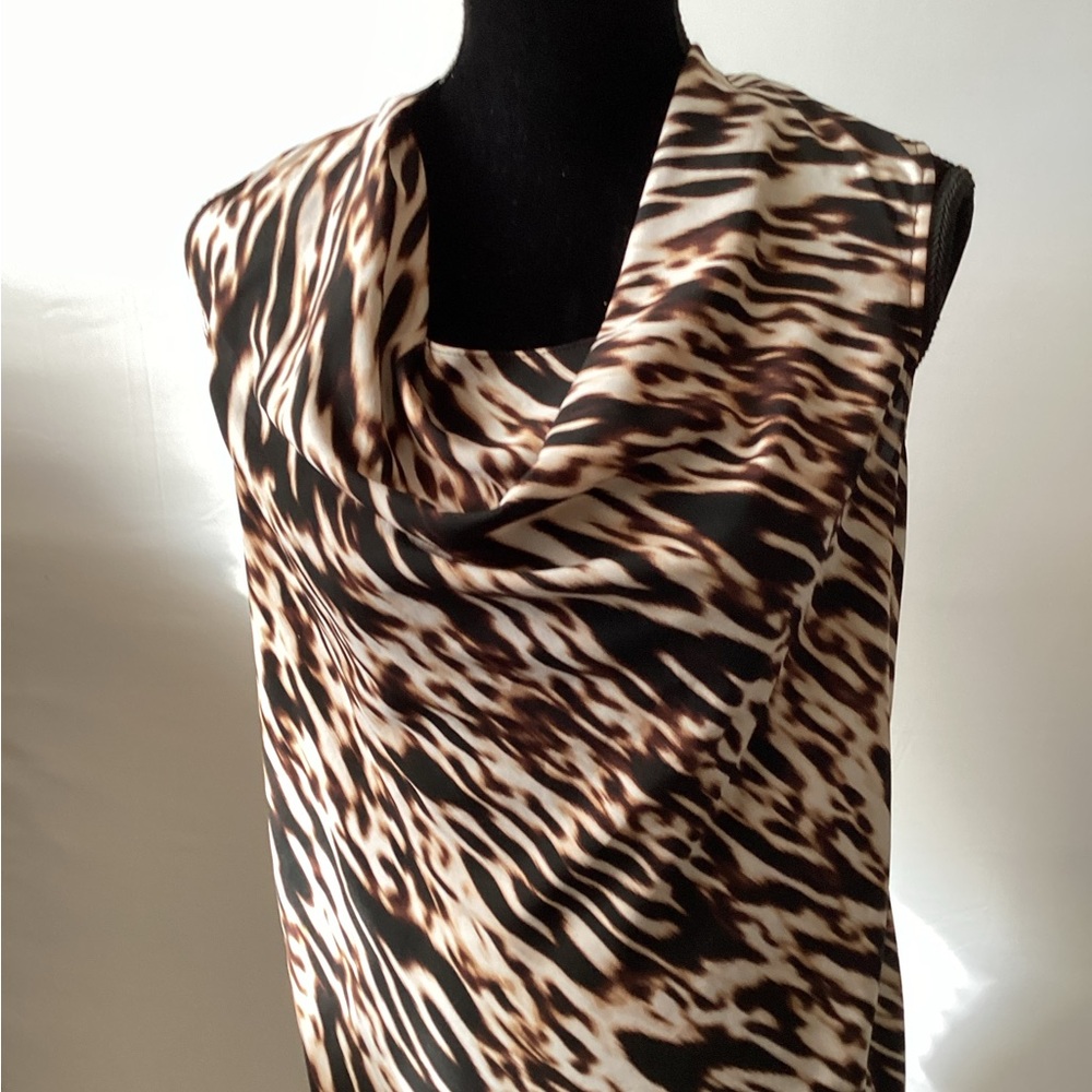 Calvin Klein animal print pullover sleeveless blouse.